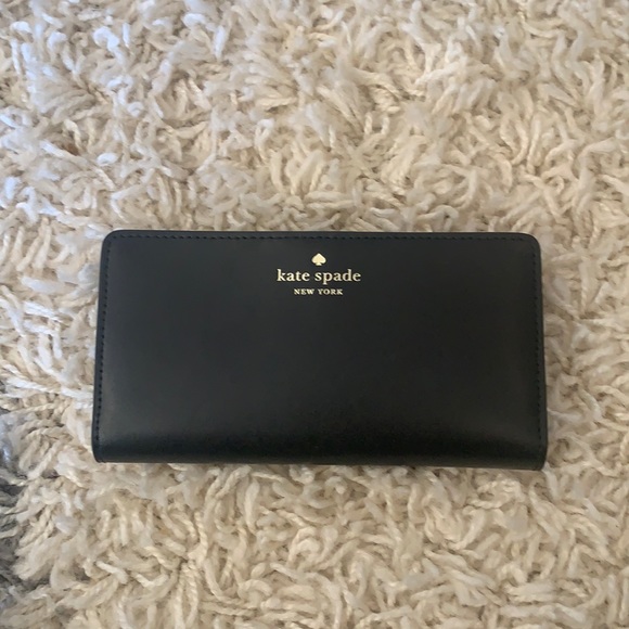 kate spade Handbags - NWT Kate spade schuyler large slim bifold wallet